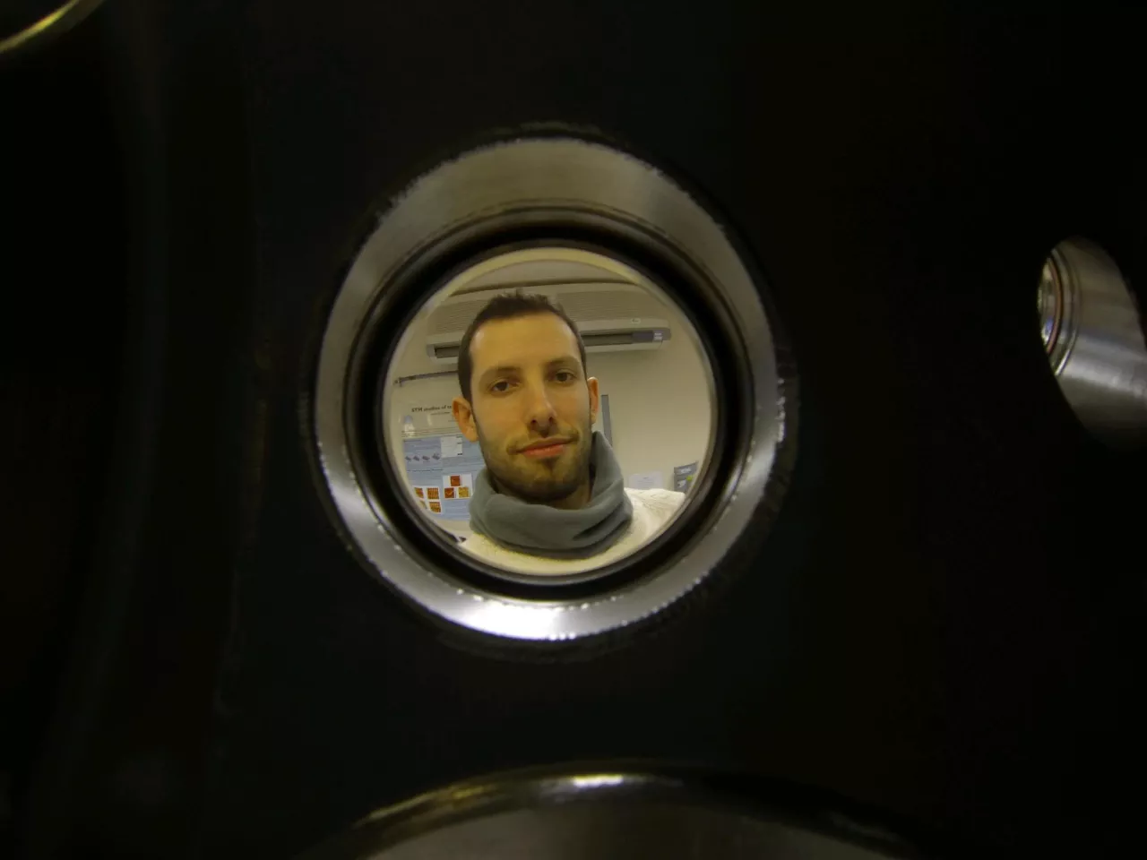 Dr. Hugo Dominguez looks into the chamber where the C14 diamond layers are "grown"