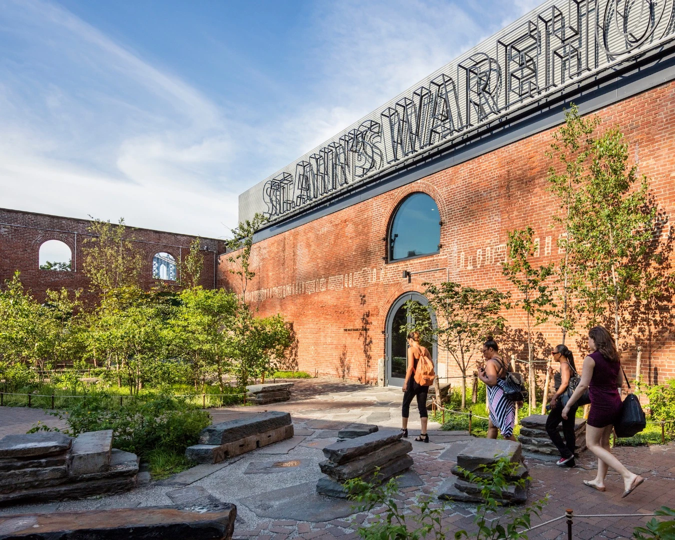 To maintain the patina of the structure, the existing masonry of the St. Ann's Warehouse was selectively preserved
