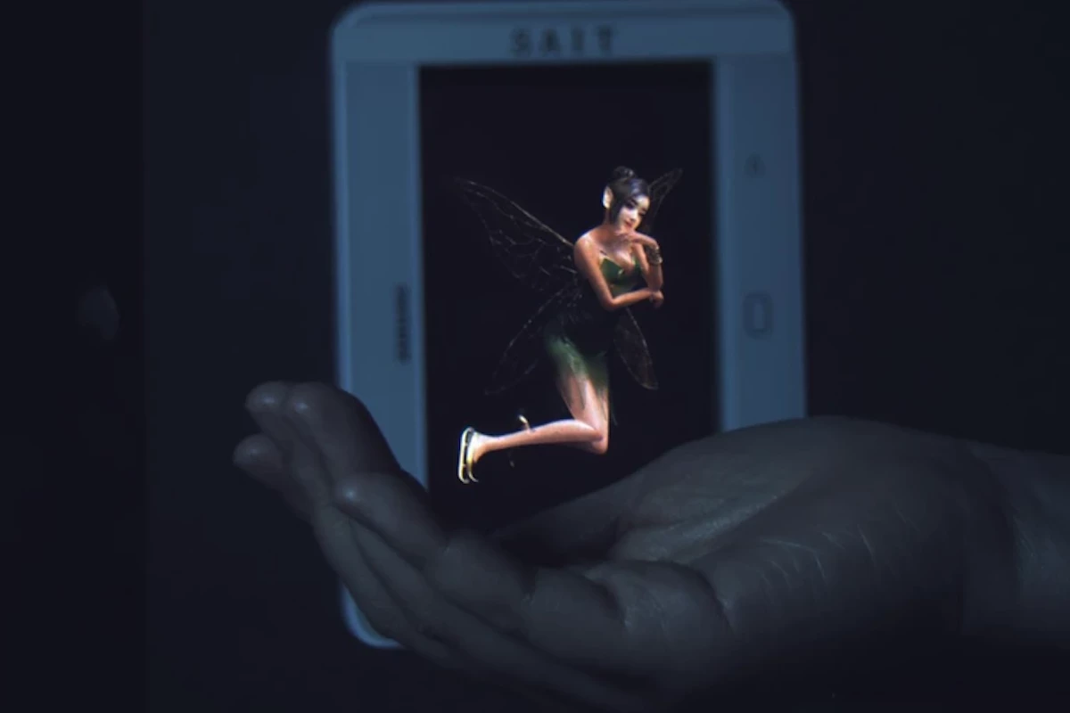 Thanks to Samsung's prototype hologram device, the fairy appears to be hovering in the hand – but in actuality she's displayed on the screen in the background