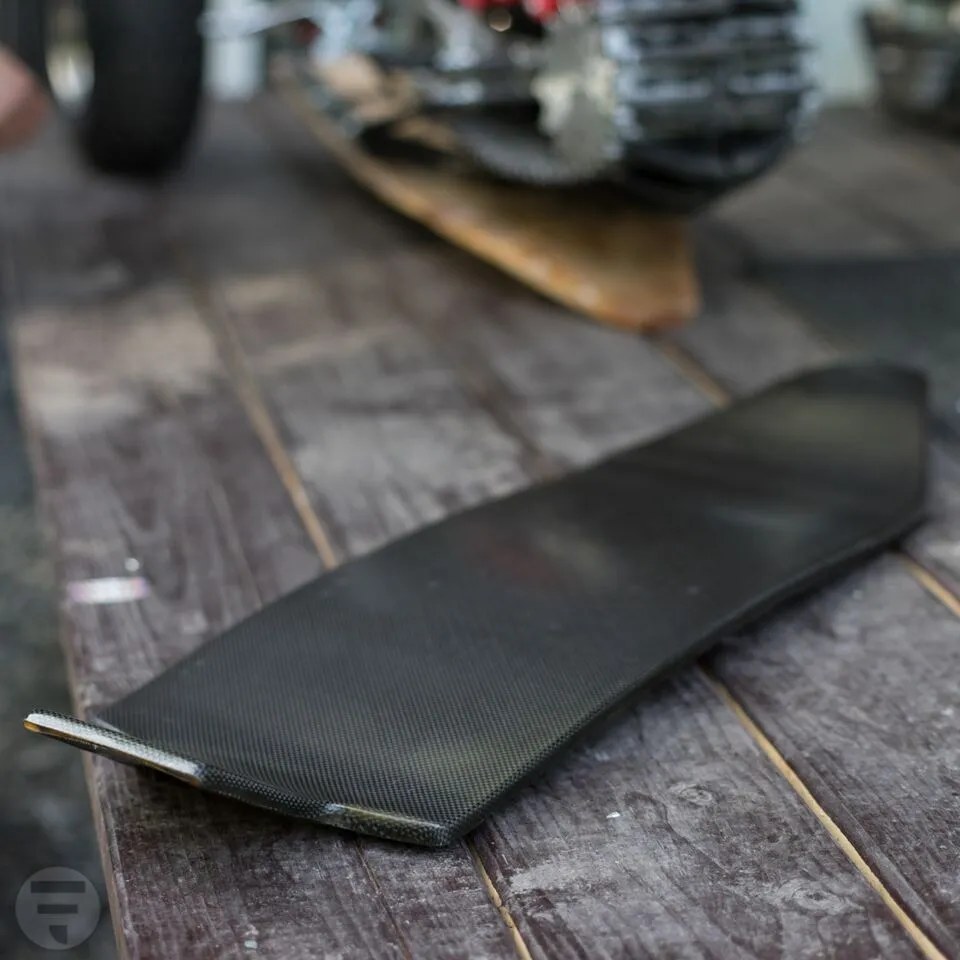 Flux uses a lightweight deck made from carbon and Kevlar layered around a core