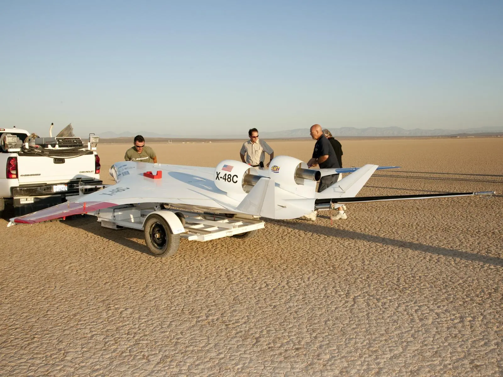 Boeing Phantom Works technicians prepare the sub-scale X-48C Hybrid / Blended Wing Body technology demonstrator for its first test flight (Photo: NASA / Carla Thomas)