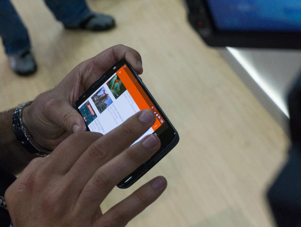 The Moto Z with Insta-Share module, projecting a demo onto a wall