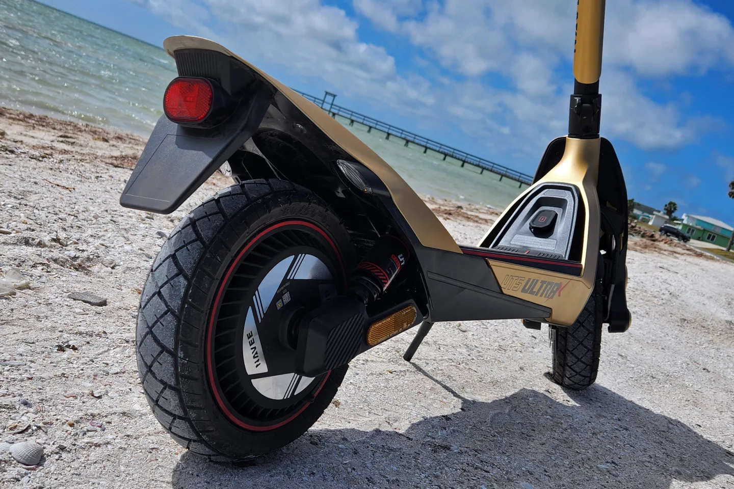 The charge port is located at the front of the deck under a large, easily accessible grommet. I will say, of ALL the electric things I've tested, scooters, bikes, trikes, eboards, EUCs, etc, this one has the easiest, most tactile charging port of all – a big round keyed plug (just a flat detent on part of it) that goes into a big round hole. It's refreshing to not have to look at the port and the plug every time to line it up just right.