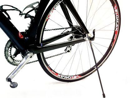 The Upstand attaches to the bike's rear wheel via a magnet