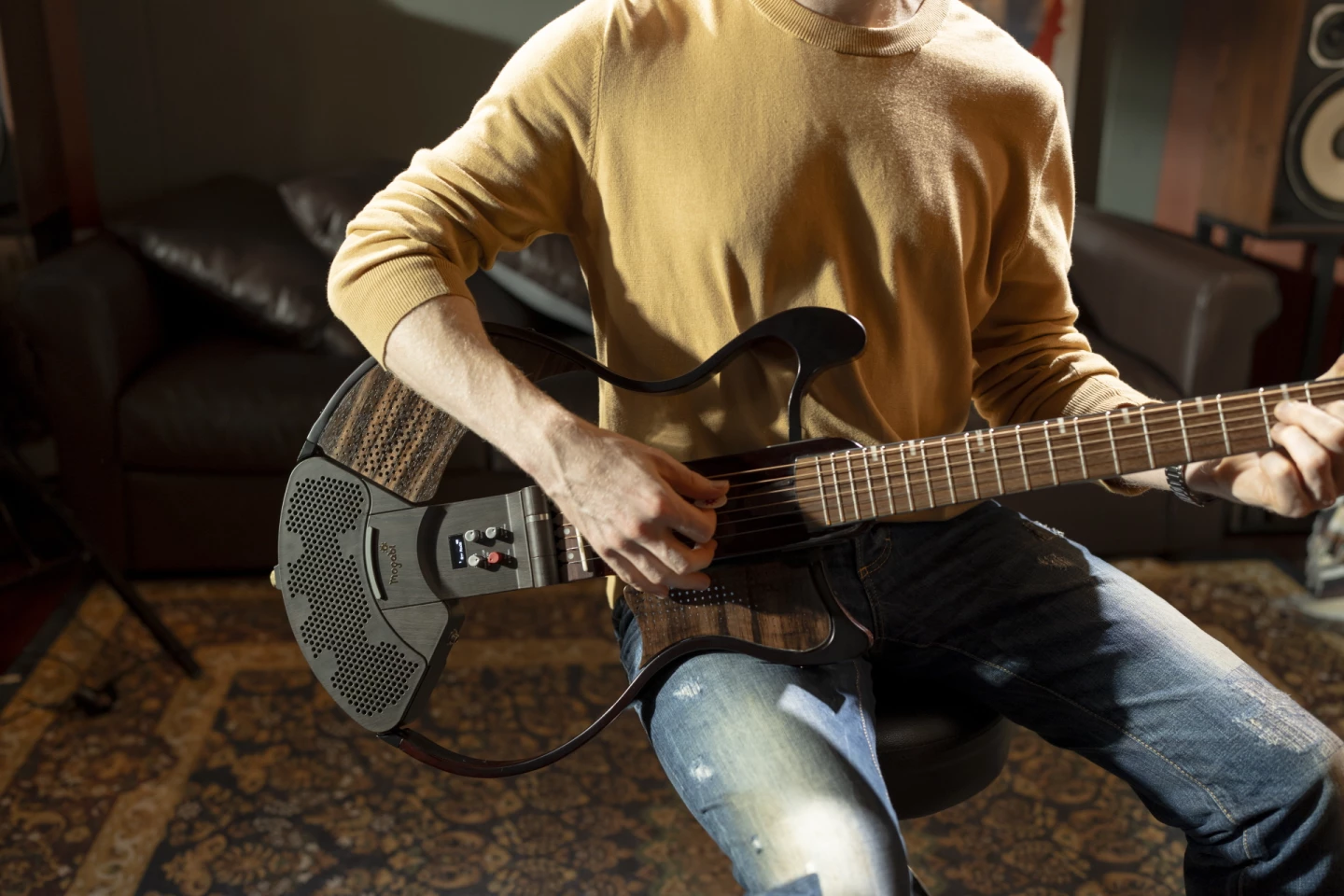 The Mogabi V3 travel guitar is also available as an electric/acoustic