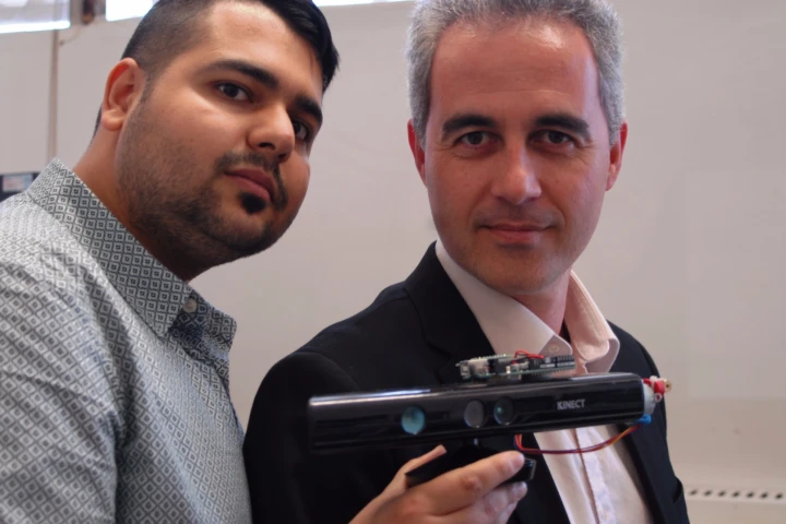 Amin Amini Maghsoud Bigy and Dr Konstantinos Banitsas with the Kinect modified to help Parkinson's patients overcome Freezing of Gait