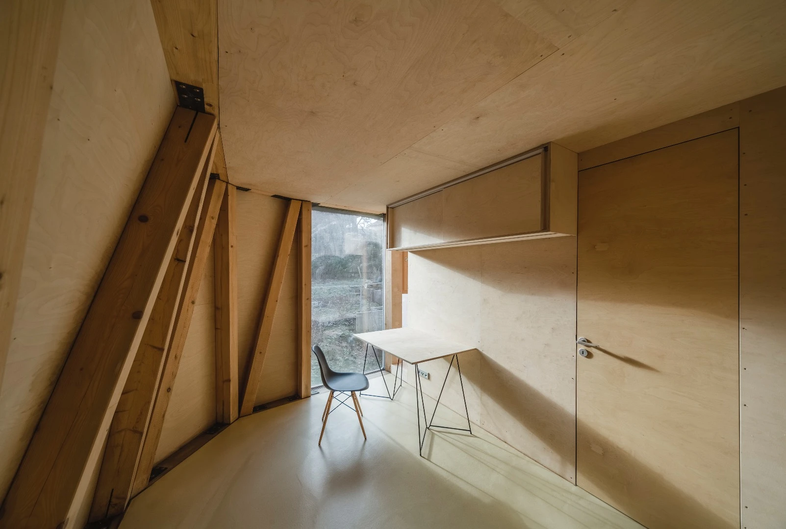 The House in the Orchard's interior is very utilitarian