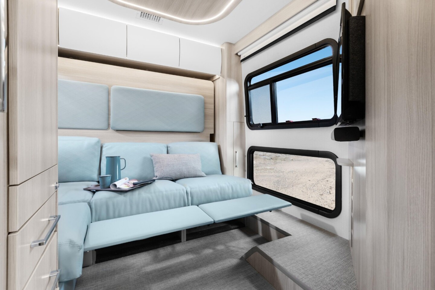 The sectional sofa includes a pair of reclining seats/footrests for more comfort