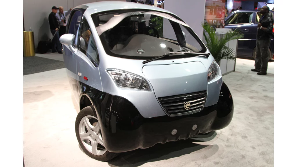 The TRIAC three-wheeled electric vehicle competes with regular gas-powered cars on performance and price