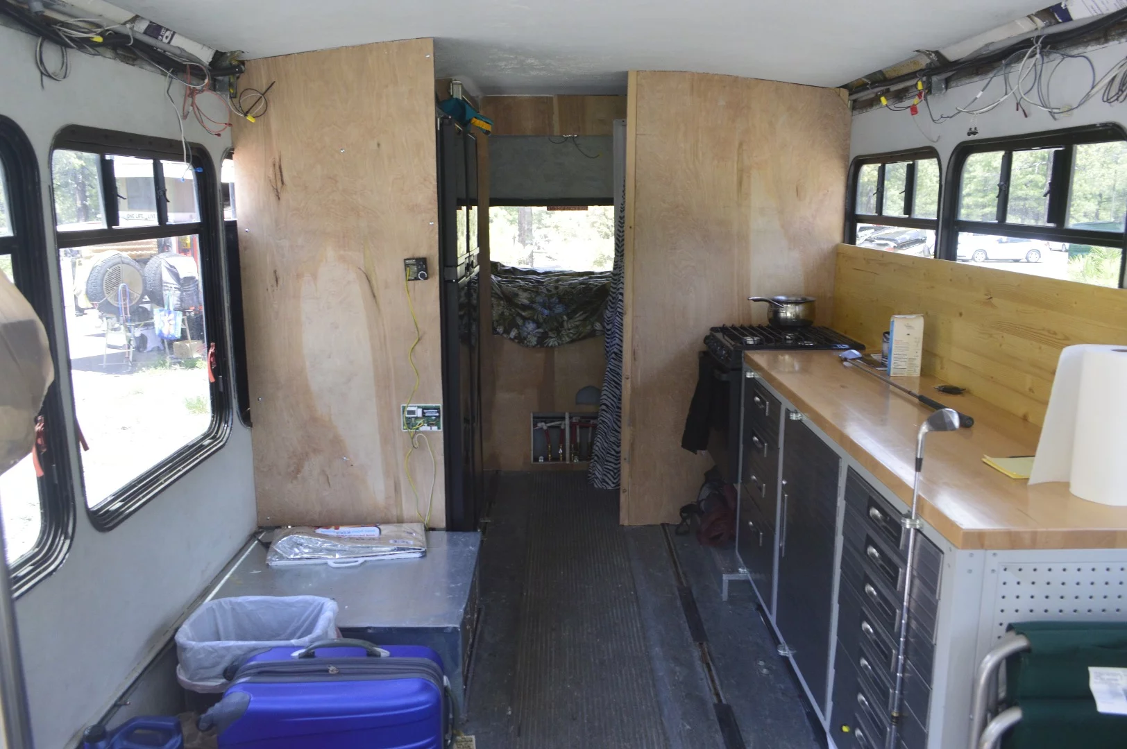 The interior of this converted bus isn't the coziest motorhome we've seen, but it definitely is open and spacious