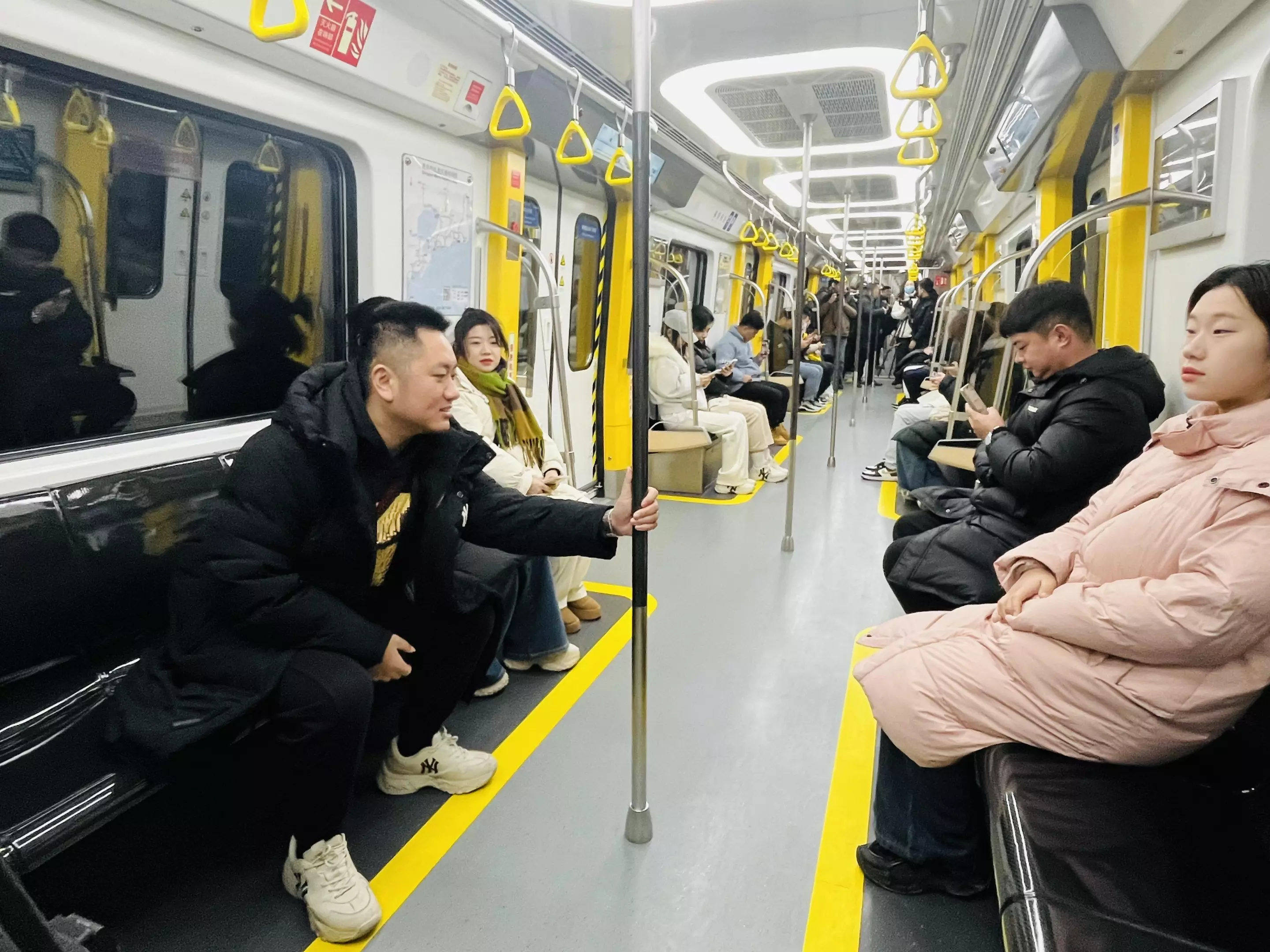 Passengers aboard the world's first carbon fiber subway train