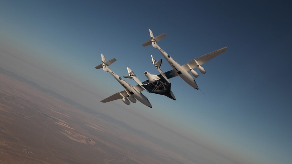 VSS Enterprise on its first manned flight attached to VMS Eve