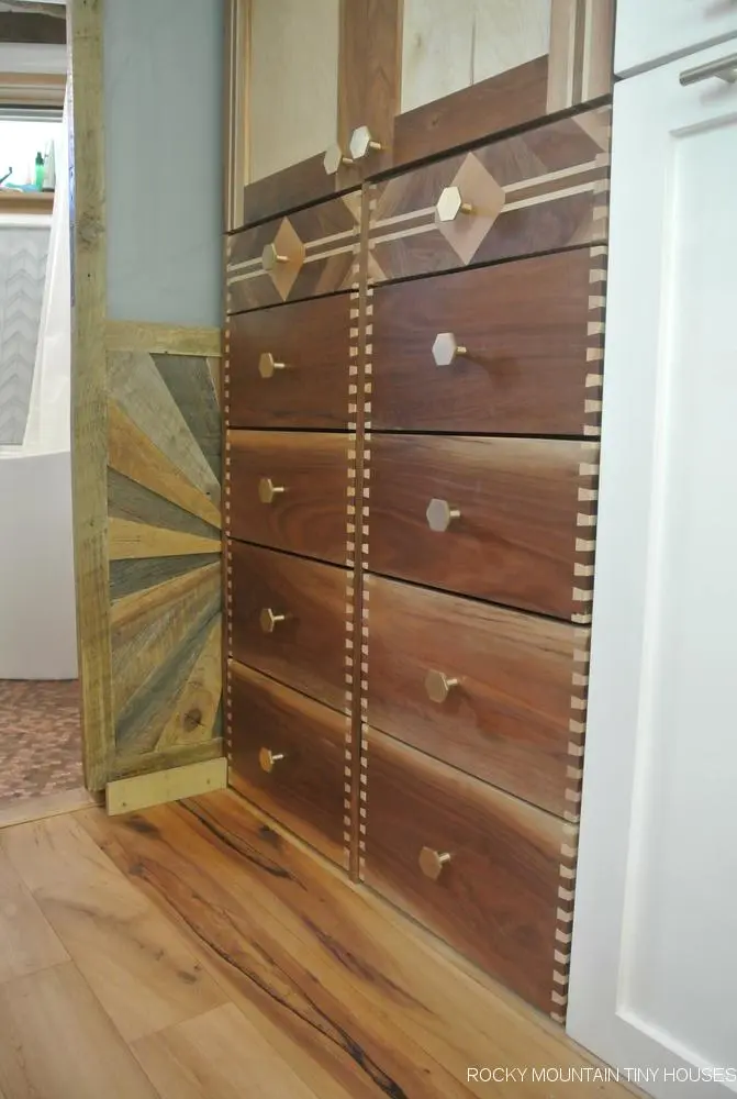 The San Juan Tiny House has a small storage/utility room