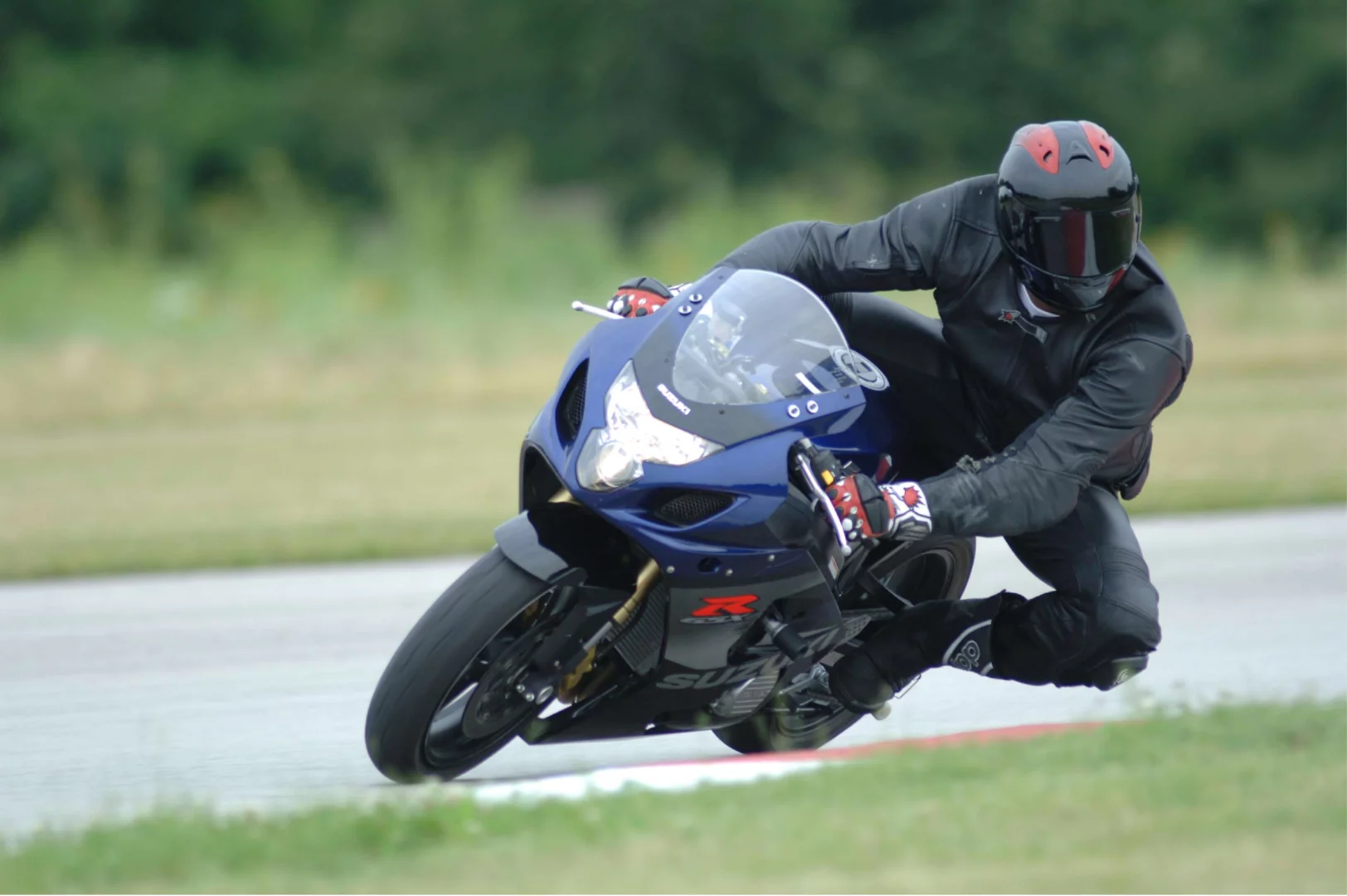 Michael Jordan having fun on a GSX-R on track