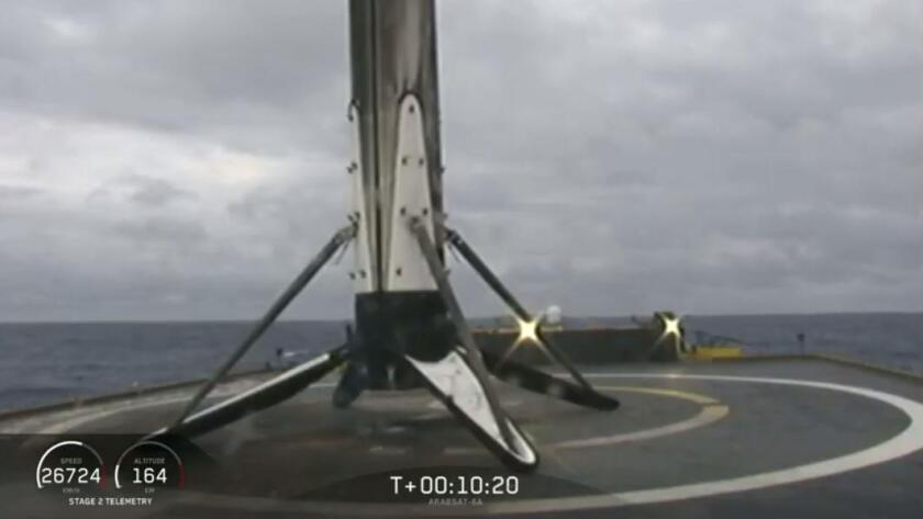 Falcon booster lands on the SpaceX's drone ship at sea