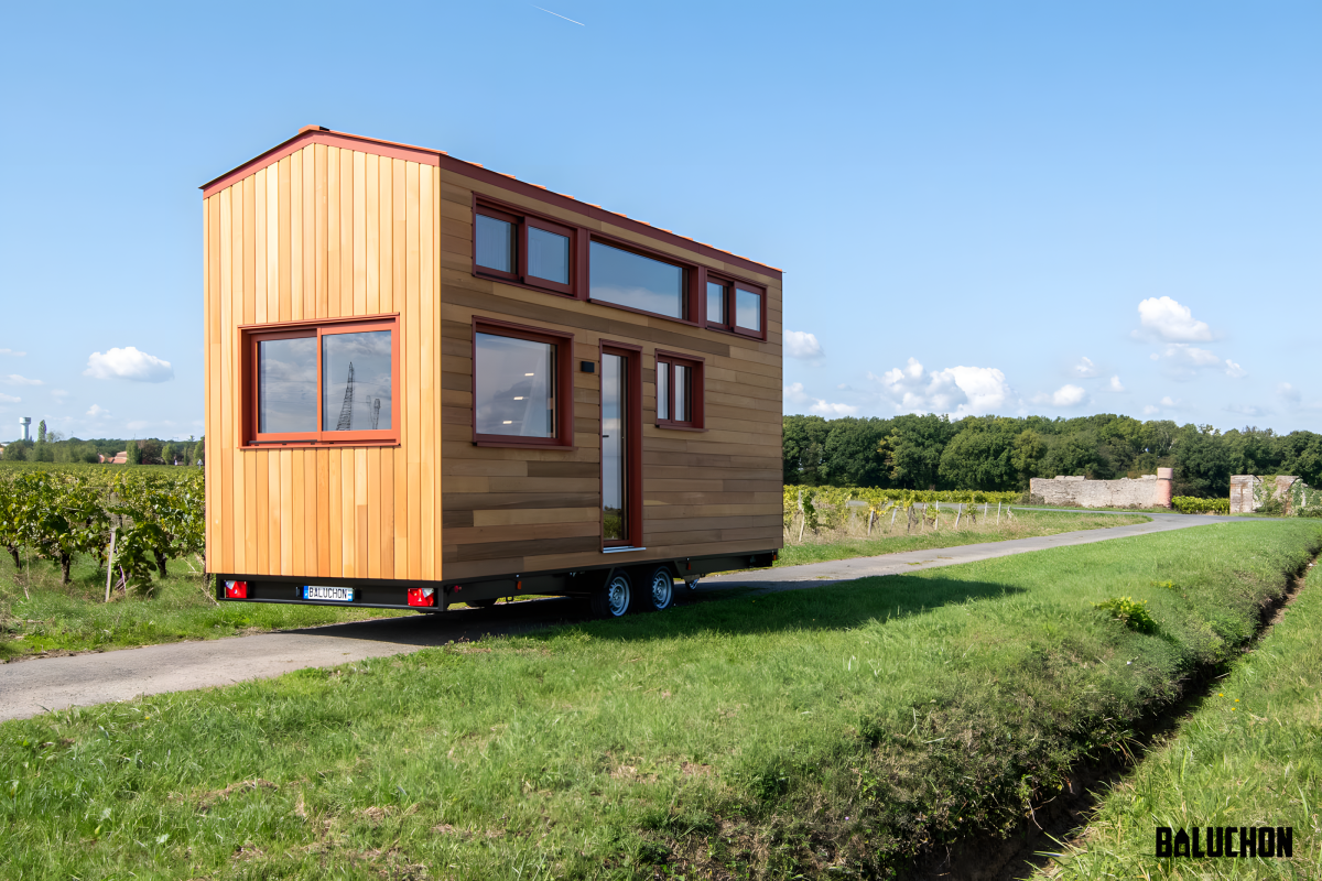 Space-saving tiny house swaps its upper floor for a net