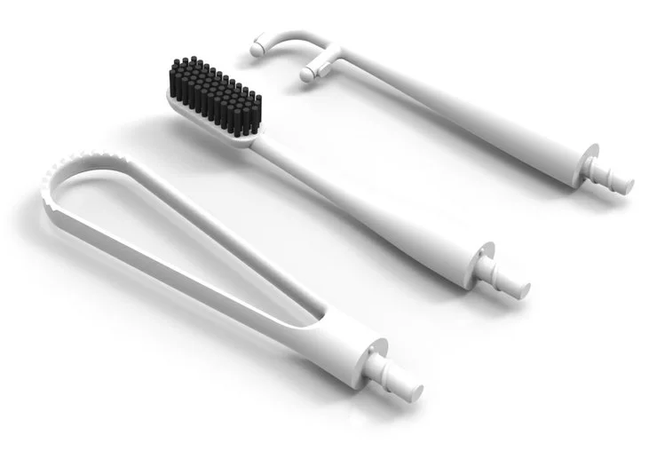 The toothbrush uses bristles made from biodegradable charcoal fibers, while the flossing and tongue scraping attachments are made from polished bamboo composite