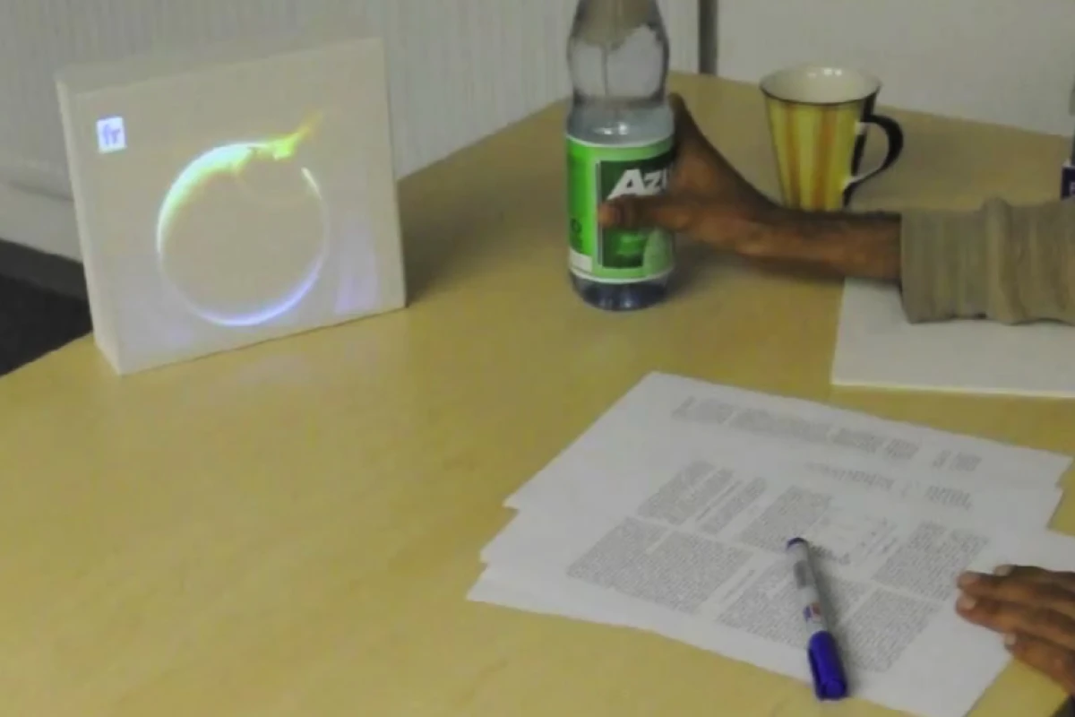 LightBeam allows physical objects, such as a water bottle, to act as a control for the pico projector