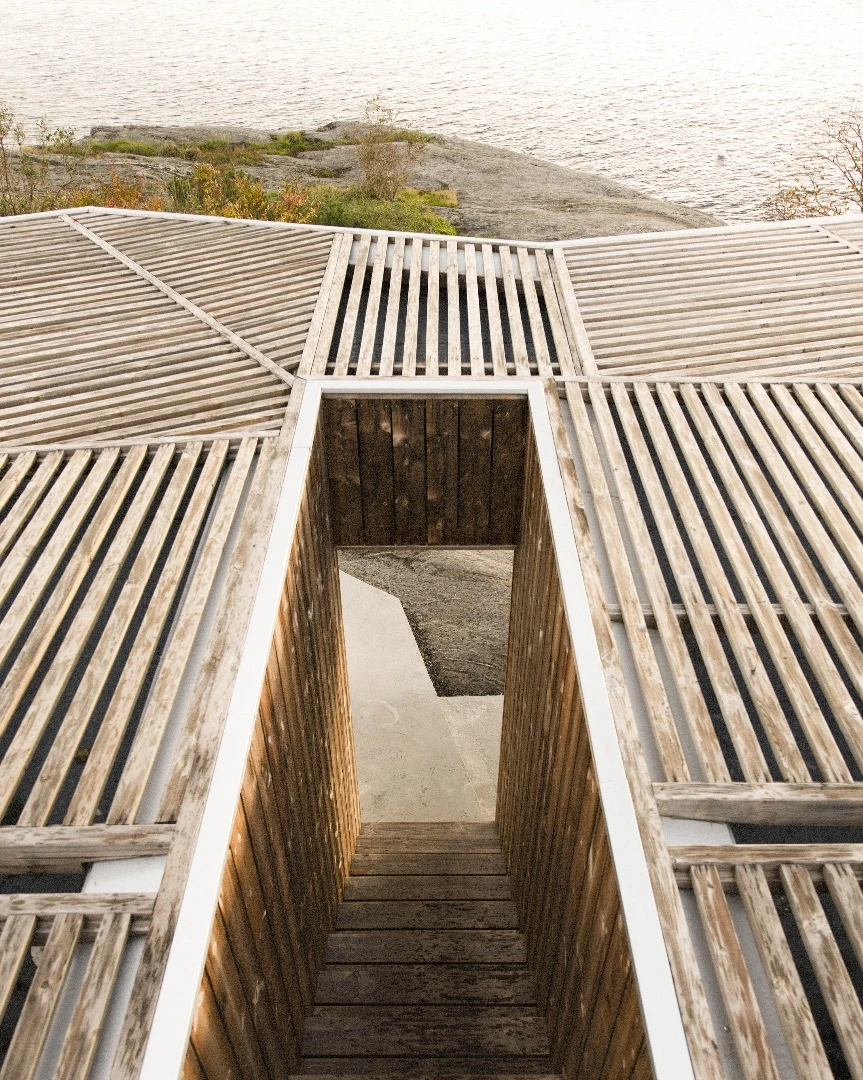 Steps lead up to House on an Island's rooftop