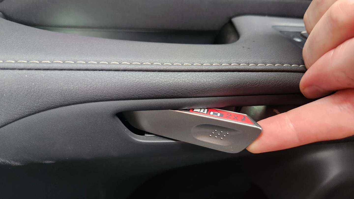 When pushed, the combination latch handle on today's Lexus vehicles electronically releases the latch. When pulled, as shown, it acts as a physical handle, pulling a cable to manually unlatch it