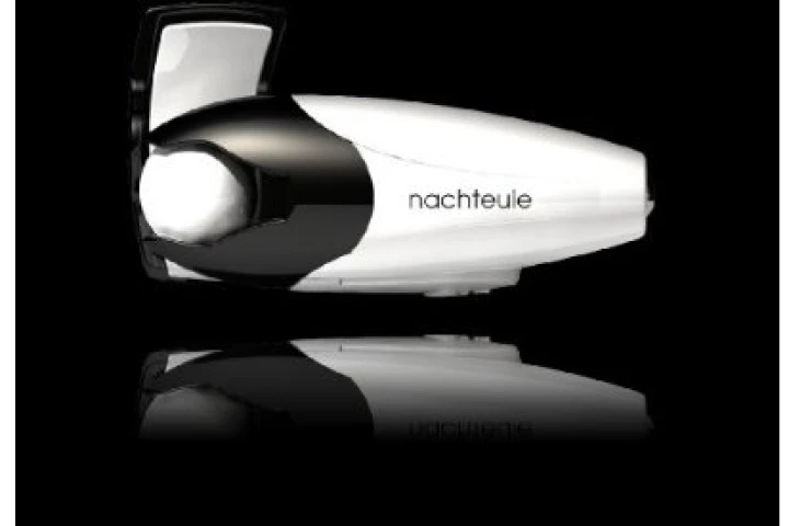 The Nachteule light clips on to reading glasses - its LED produces the equivalent of a 60W globe