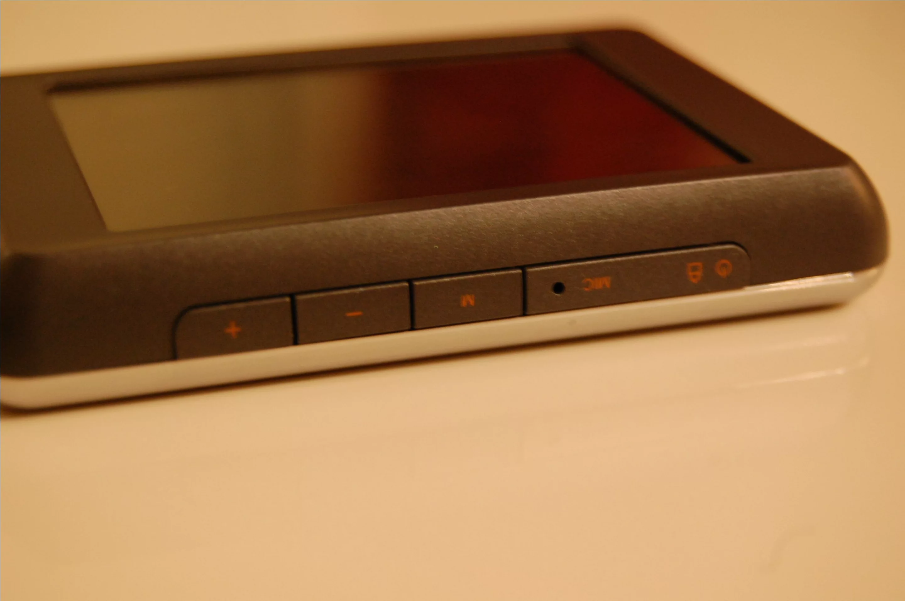 Along the top are some control buttons, including power/hold and a useful Menu key, which returns you to a top level screen wherever you may be within the player