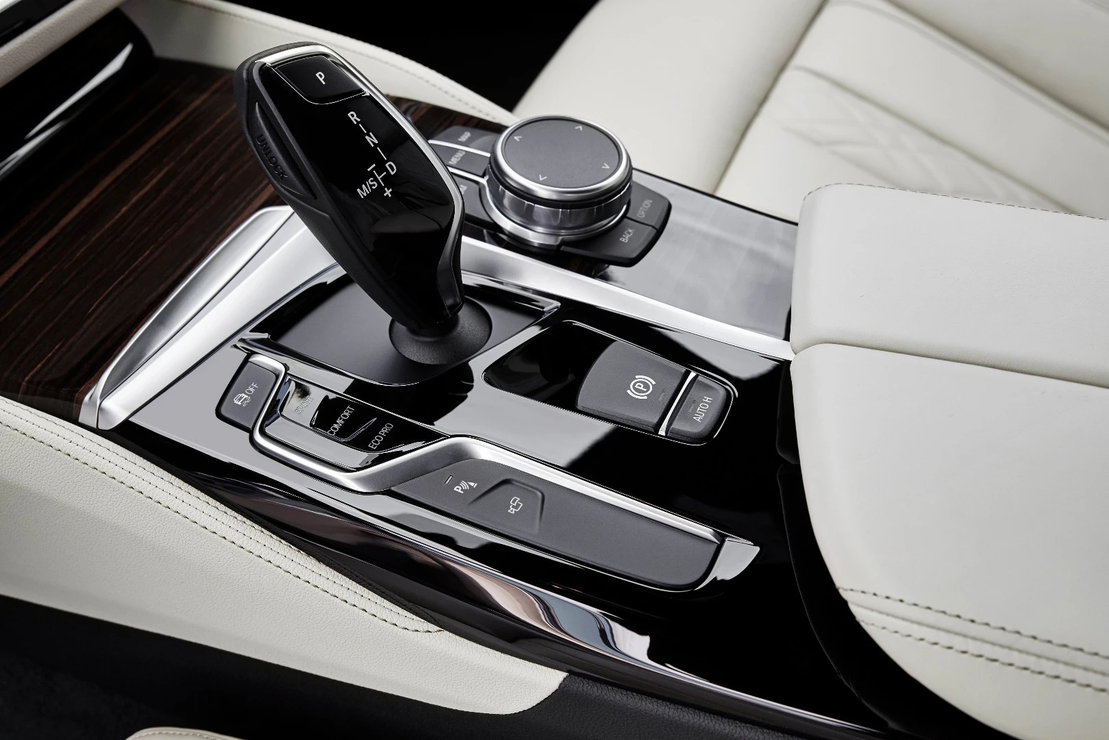 The iDrive infotainment system can be controlled by touch or twist in the BMW 5 Series