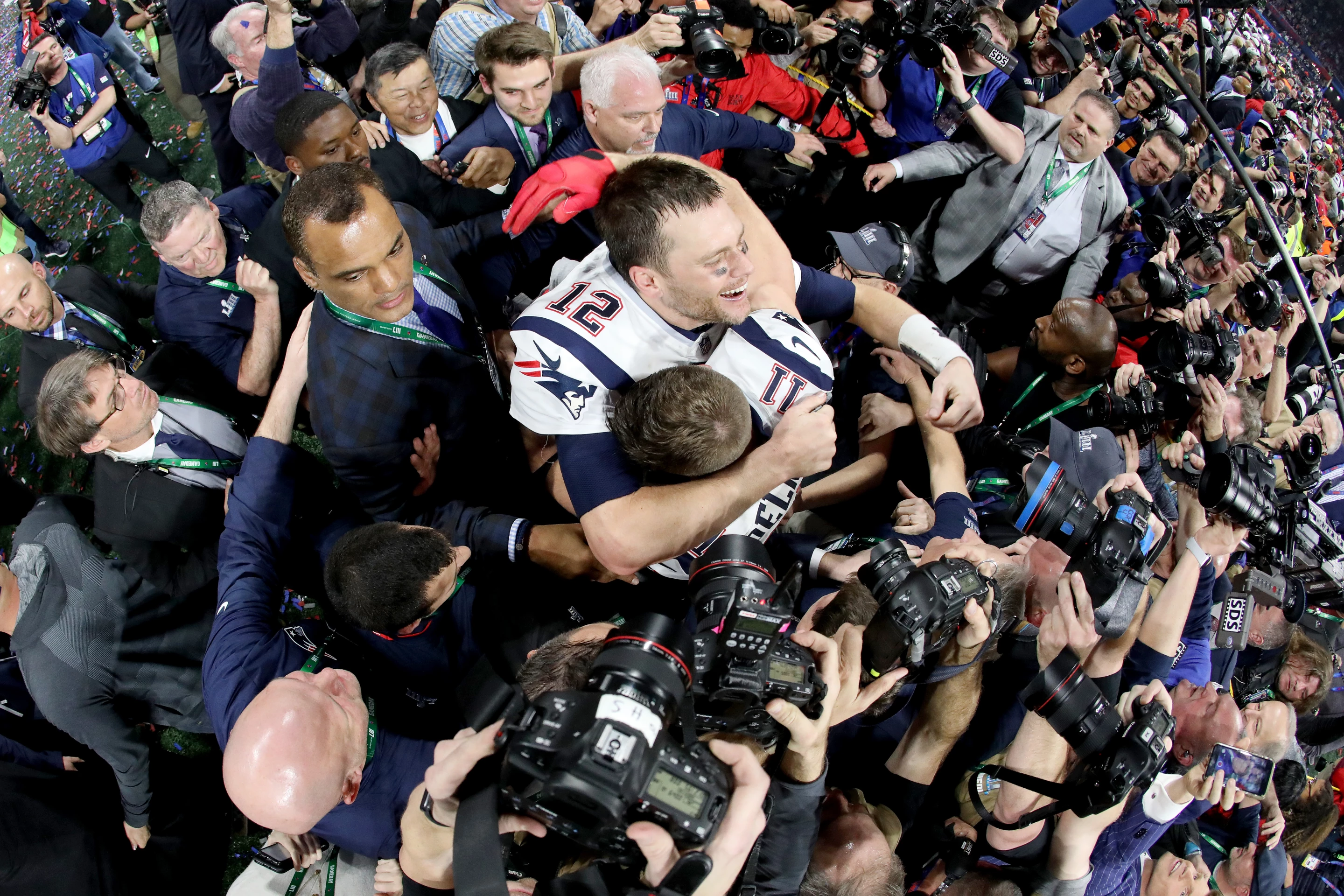Bronze Prize, Celebration. Tom Brady of the New England Patriots and Julian Edelman celebrate their teams 13-3 win over the Los Angeles Rams during Super Bowl LIII at Mercedes-Benz Stadium on February 03, 2019 in Atlanta, Georgia.