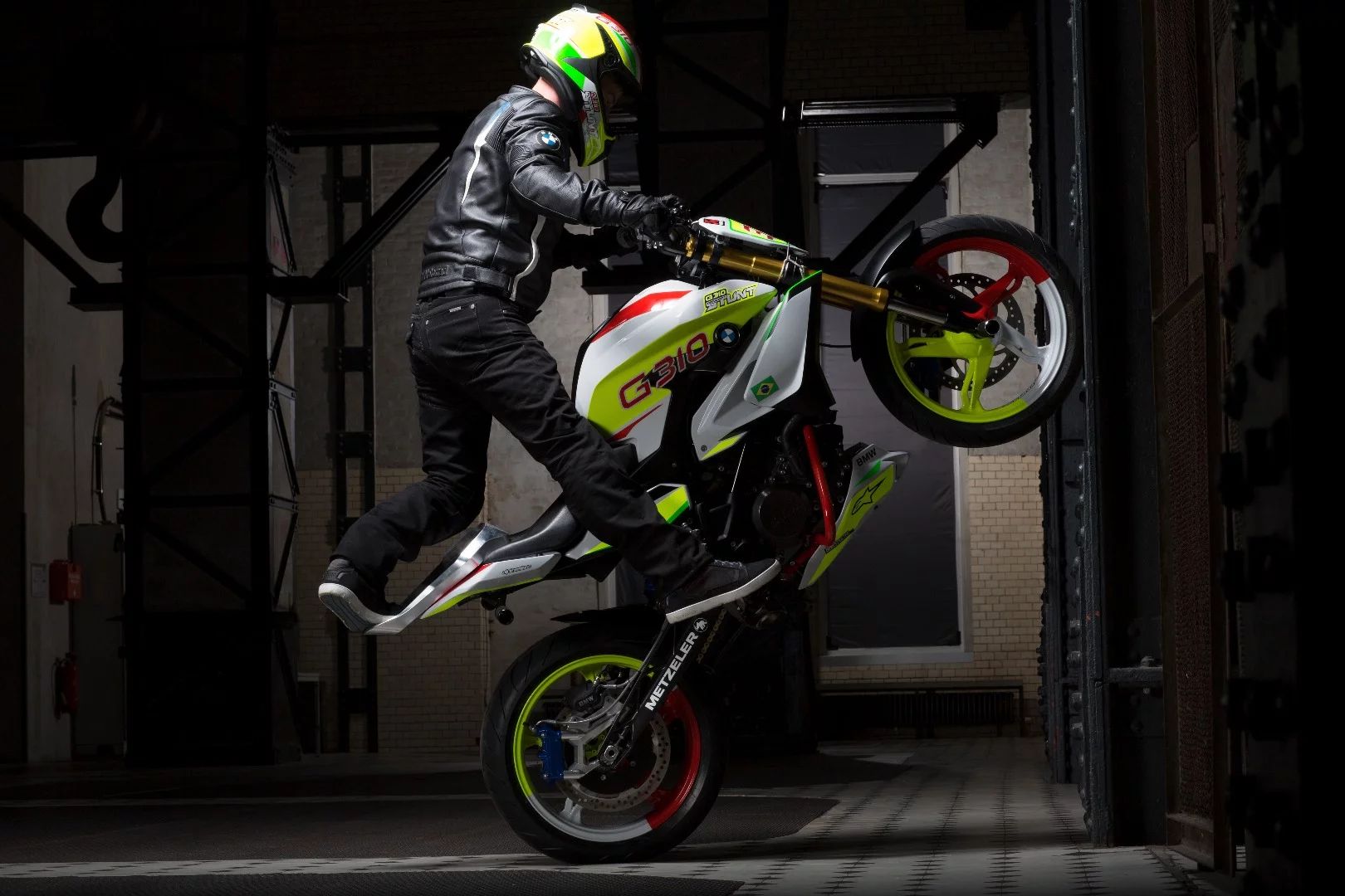 Christian Pfeiffer rides the BMW Concept Stunt G 310: stand-up wheelie