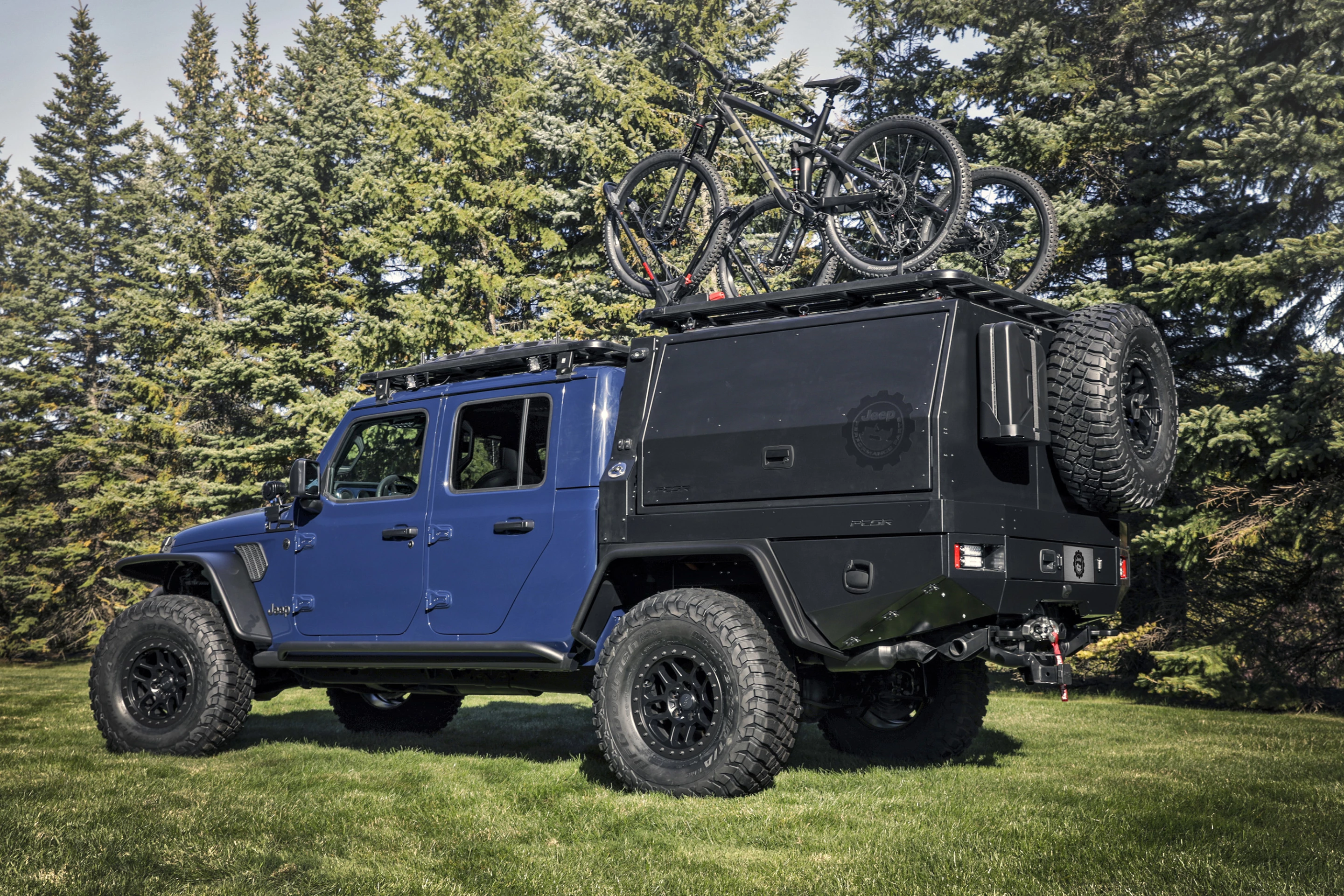 The PCOR tray bed/canopy system is the highlight of the build, turning the Jeep Gladiator from a trail-ready pickup to a mountain bike adventure rig