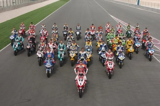 The travelling circus - the entire World Superbike and World Supersport rider and bike contengent pose for the camera at losail.