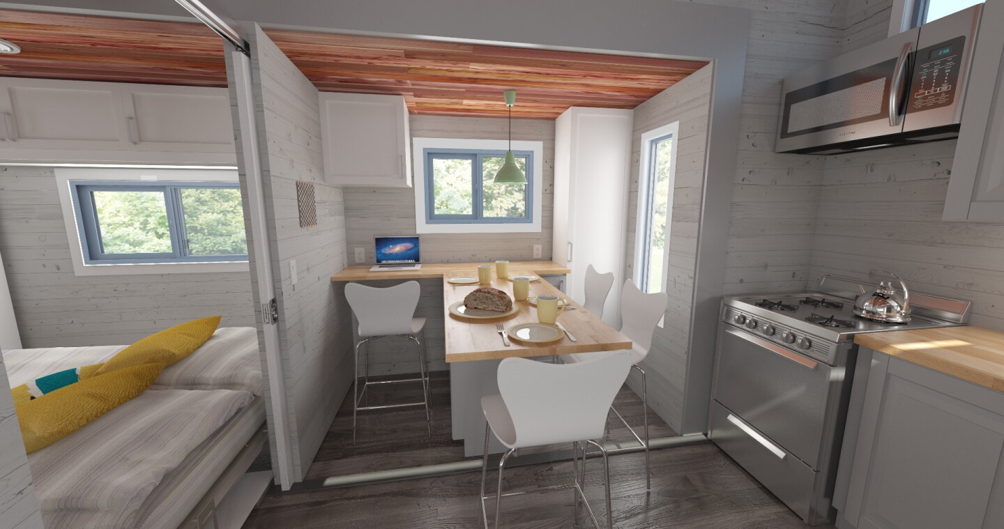Tiny house almost doubles in width at the push of a button