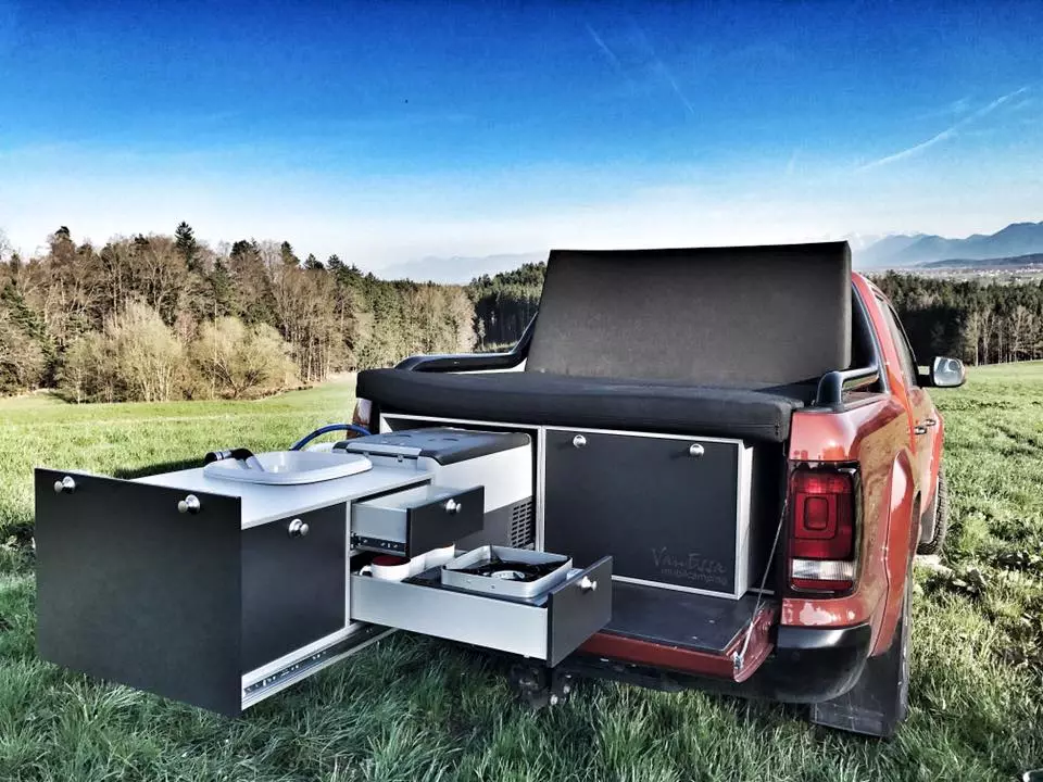 The VanEssa kitchen and folding mattress combo here turns the Volkswagen Amarok into a serious tailgating machine