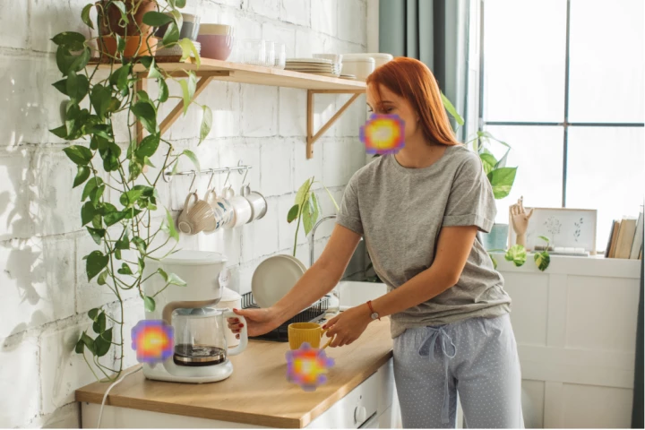 Where are the noises coming from in this picture? According to the SoundCam Go, from the coffeemaker, the mug, and her mouth