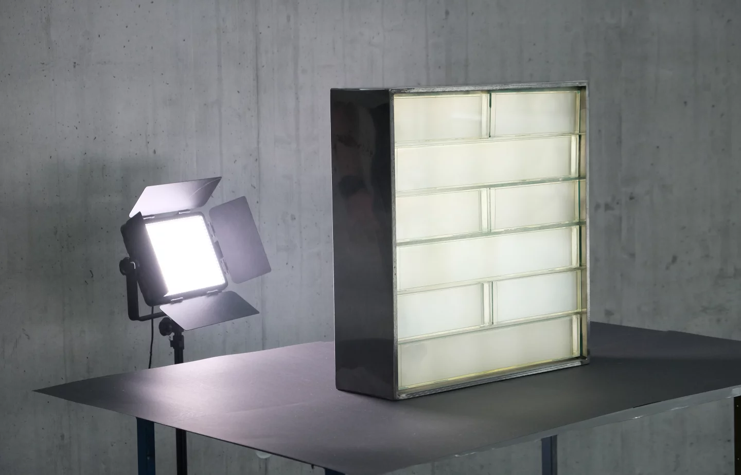 By allowing light to shine through from outside, the bricks could reduce the use (and thus cost) of indoor artificial lighting