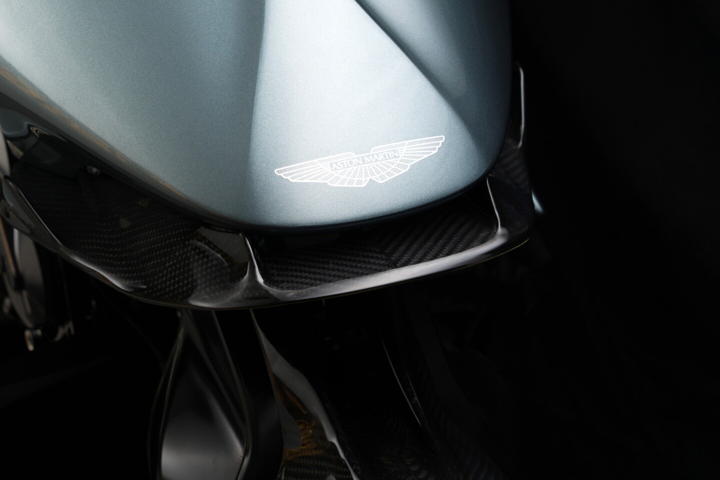 Carbon front splitter hangs under the nose fairing