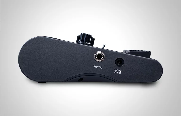 The Jam Buddy has a headphone jack to the right for quiet practice