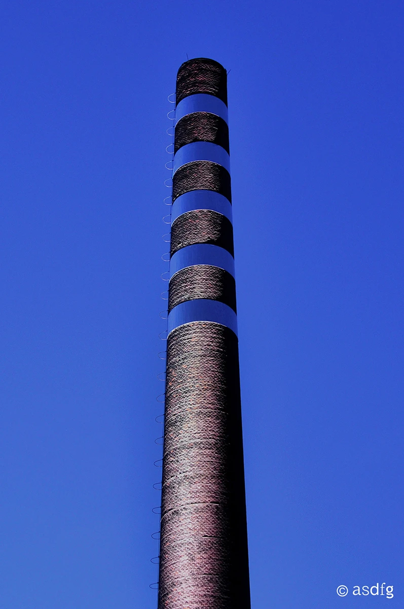 Glance up at the tower and the you will be met by the disarming sight of alternating floating and missing sections of chimney stack (Photo: asdfg)
