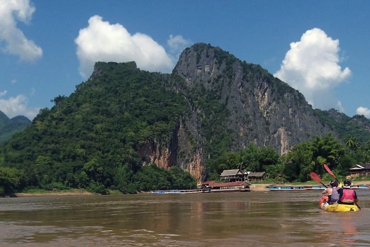 The end of the kayak journey at Pak Ou just outside Luang Prebang. My arms were looking forward to getting to the other side of the river, but a piece of my heart was left with these gentle, kind and chilled-out people and I fear for their future.