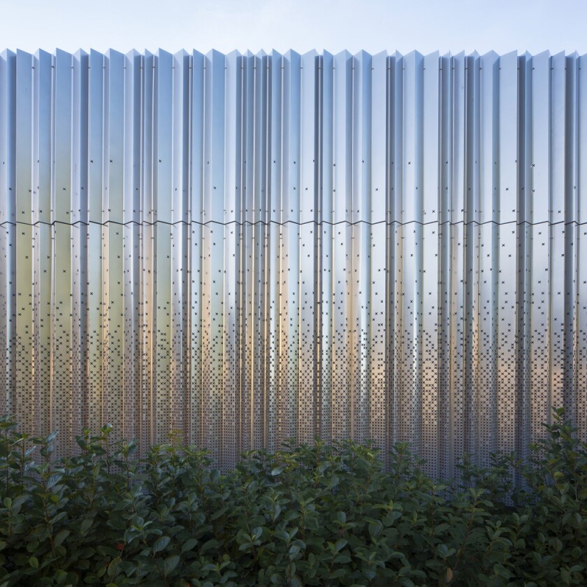 The steel cell structure has been covered with a series of impressive customized perforated aluminum sheets