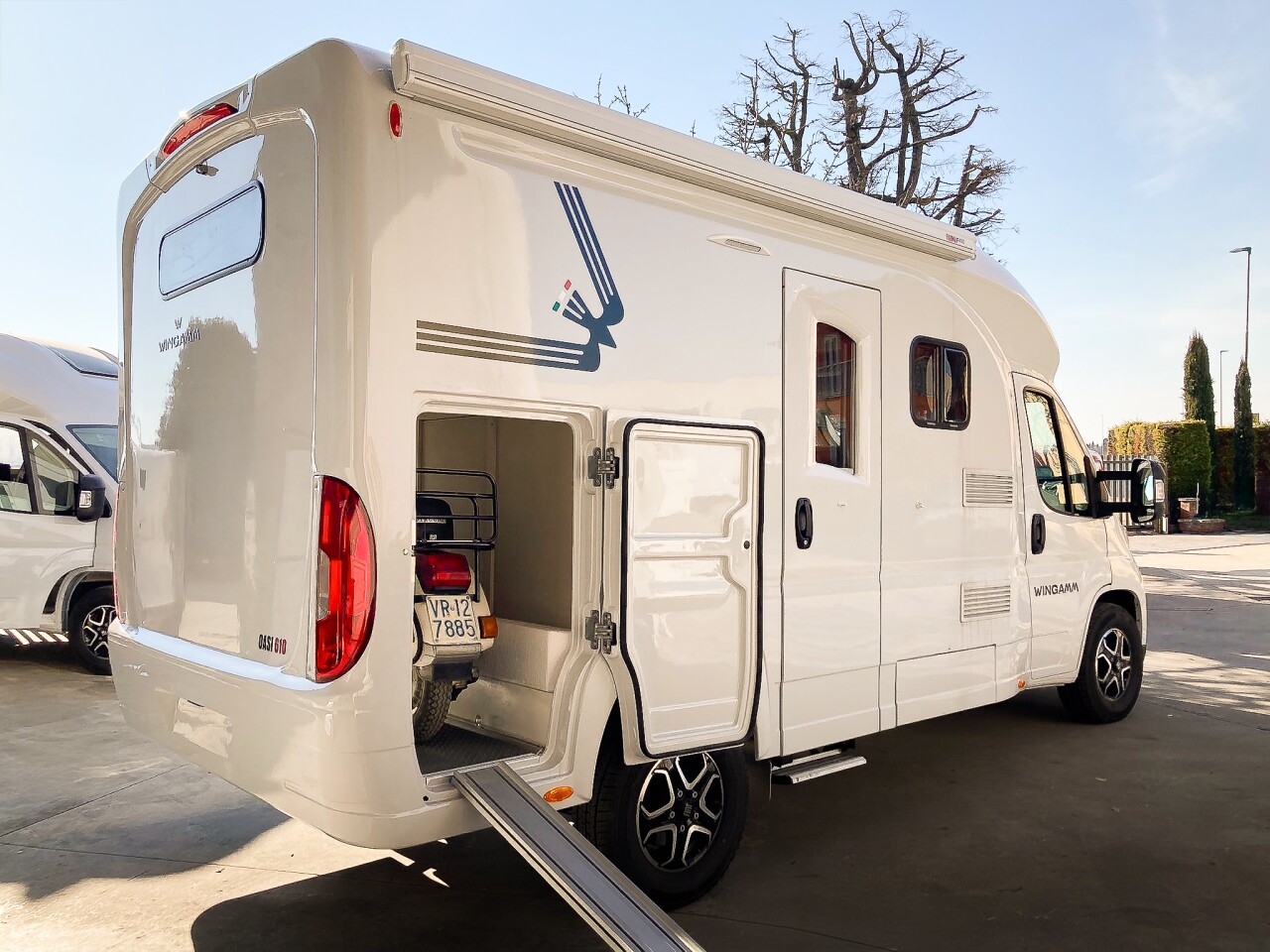 The Wingamm 640 GL features a flexible rear that transforms from bunk room to pass-thorough garage large enough for a scooter, small motorcycle or bicycles