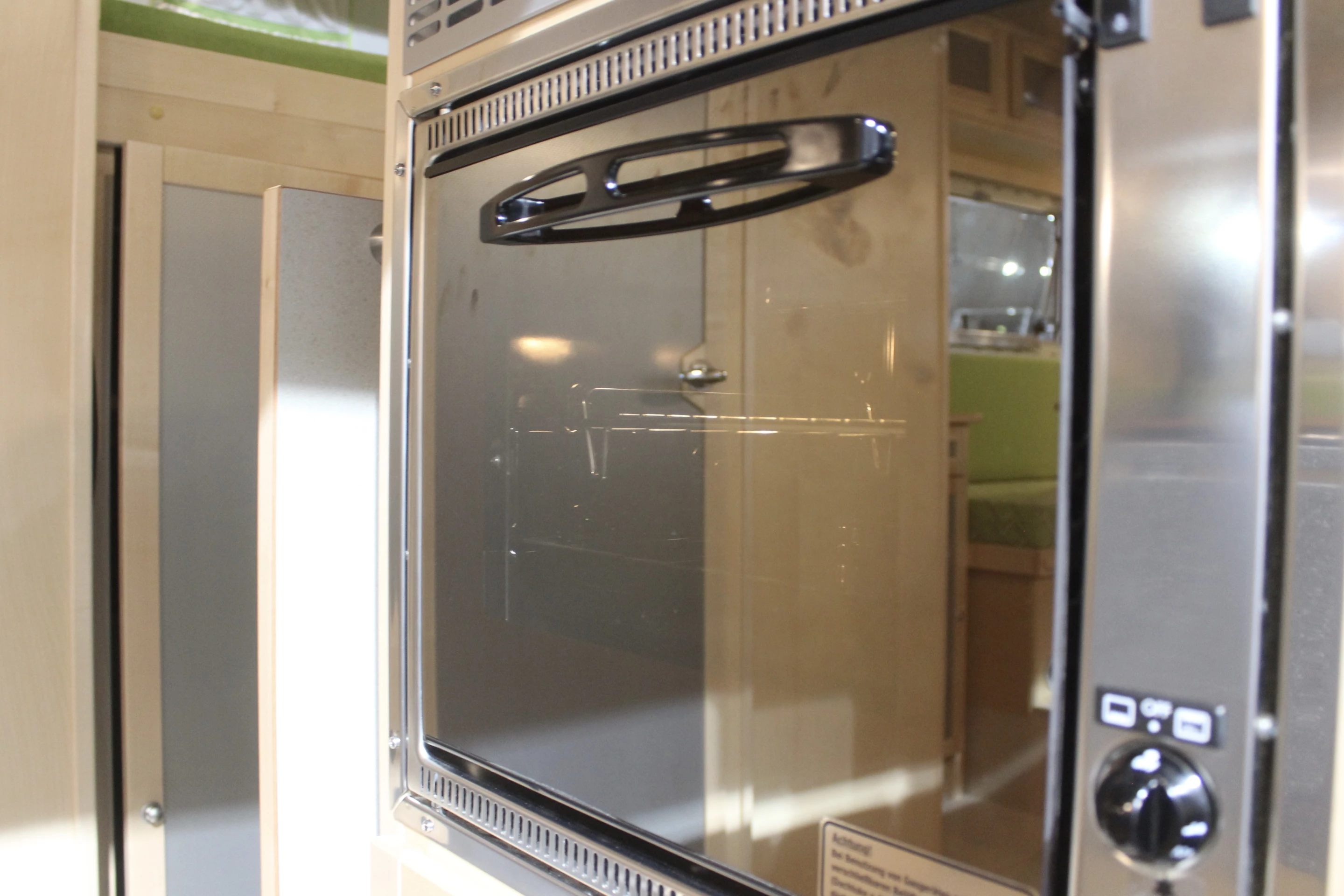This LBX 365 has an available oven right inside the entry door