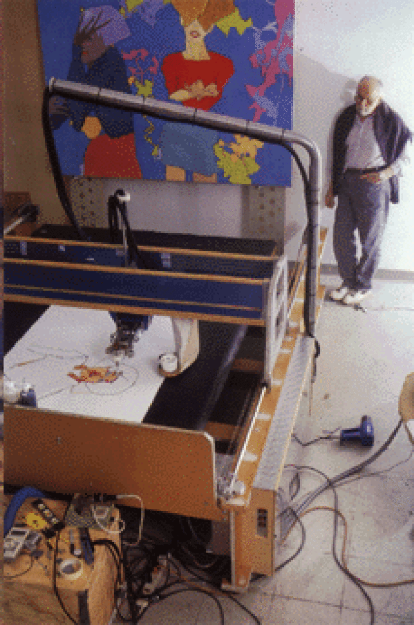 Harold Cohen watches AARON paint in 1995