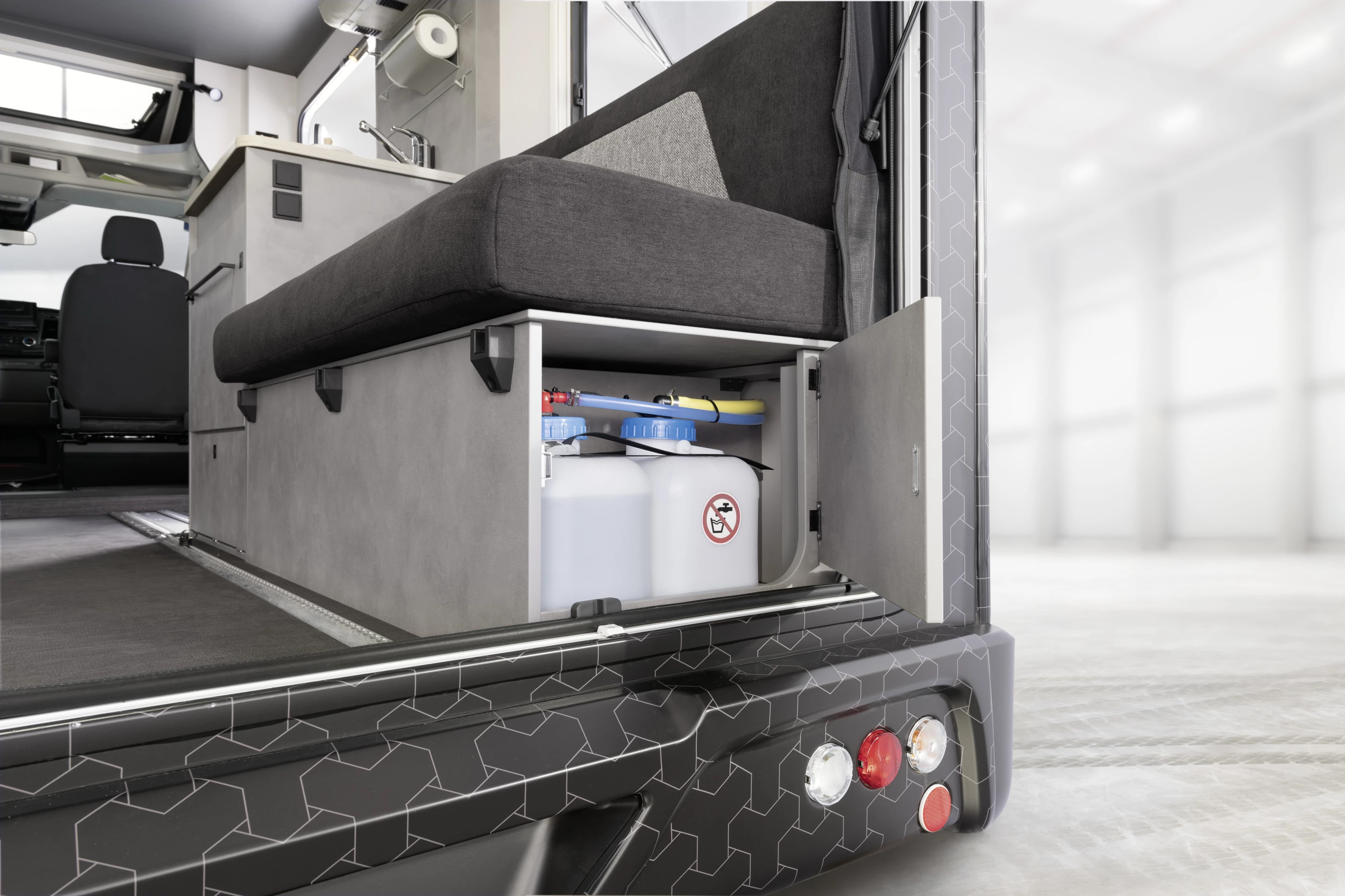 Dethleffs doesn't let any space go to waste, using the under-bench compartments as storage