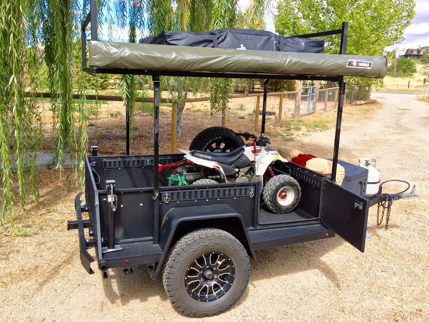 With just its bed and roof-top tent platform, the UGOAT Scout serves as a gear hauler and basic camping trailer