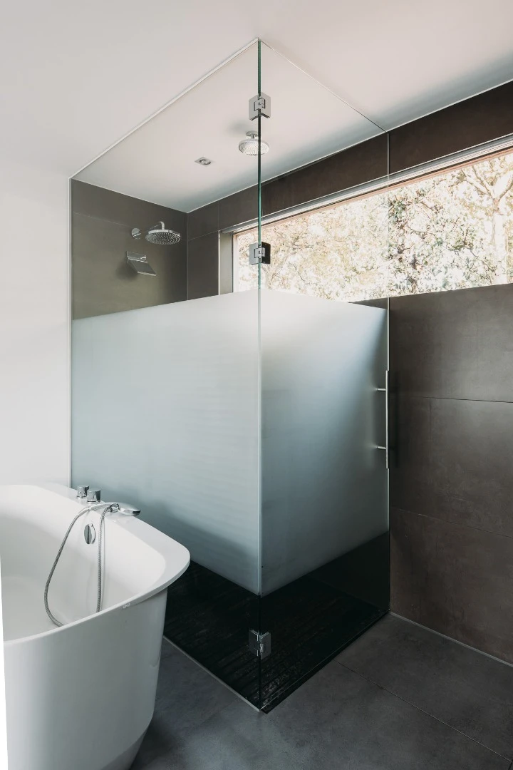 Bathtub and shower make up the master bedroom ensuite