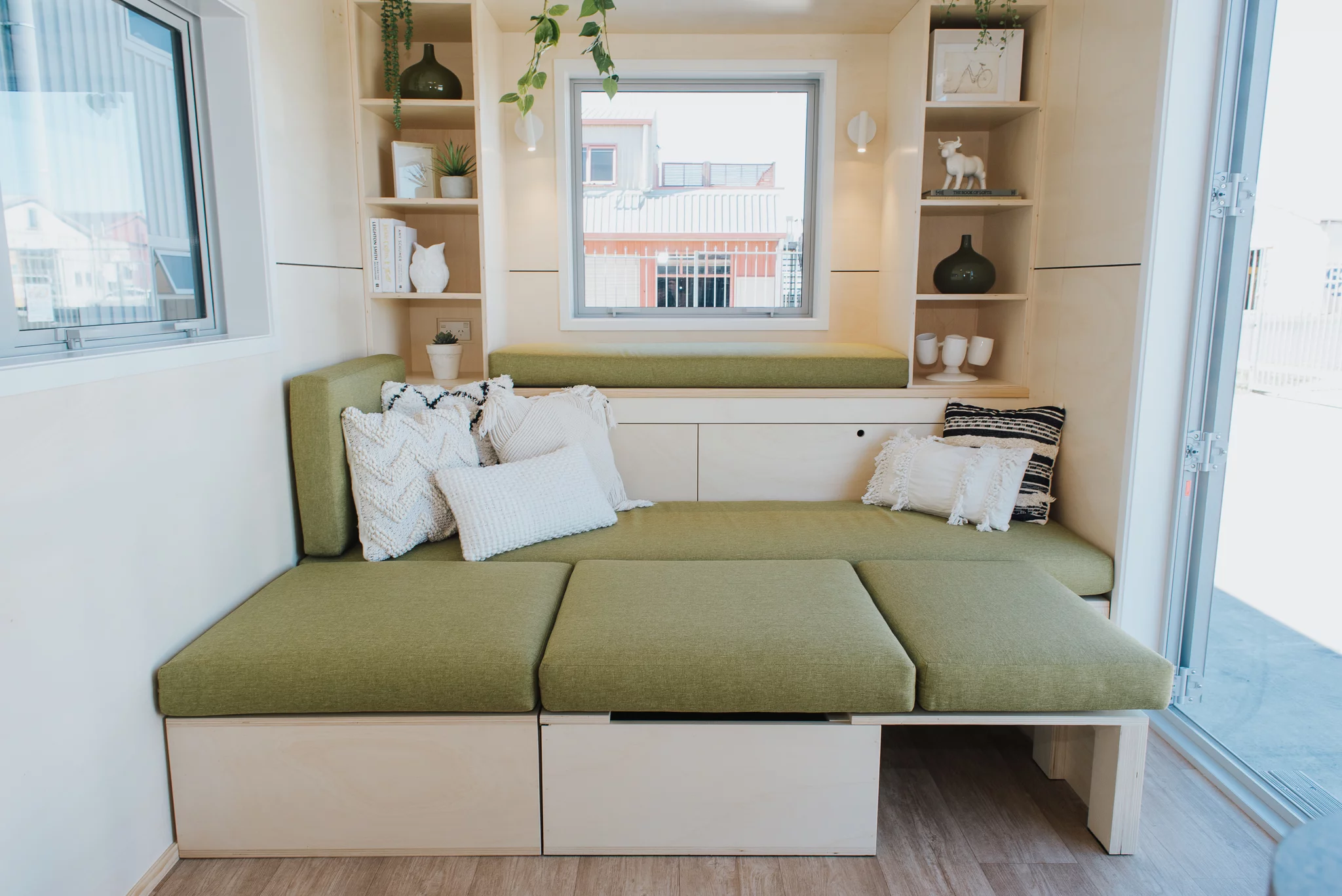 The Wai-Iti Tiny House's sofa bed contains integrated storage