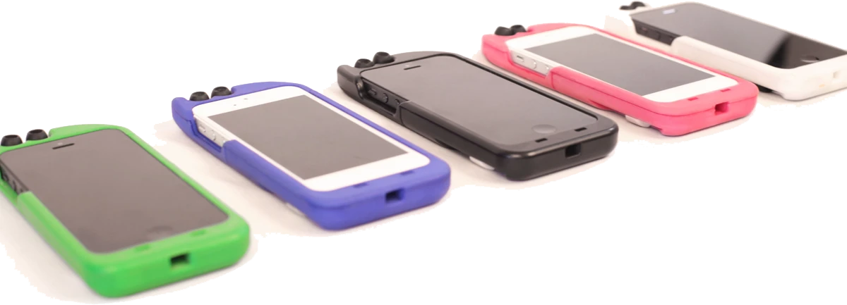 The two earbuds and winding mechanism fit unobtrusively into the case, only adding about 6 mm of thickness and 25 mm of height to an iPhone 5 when it's attached