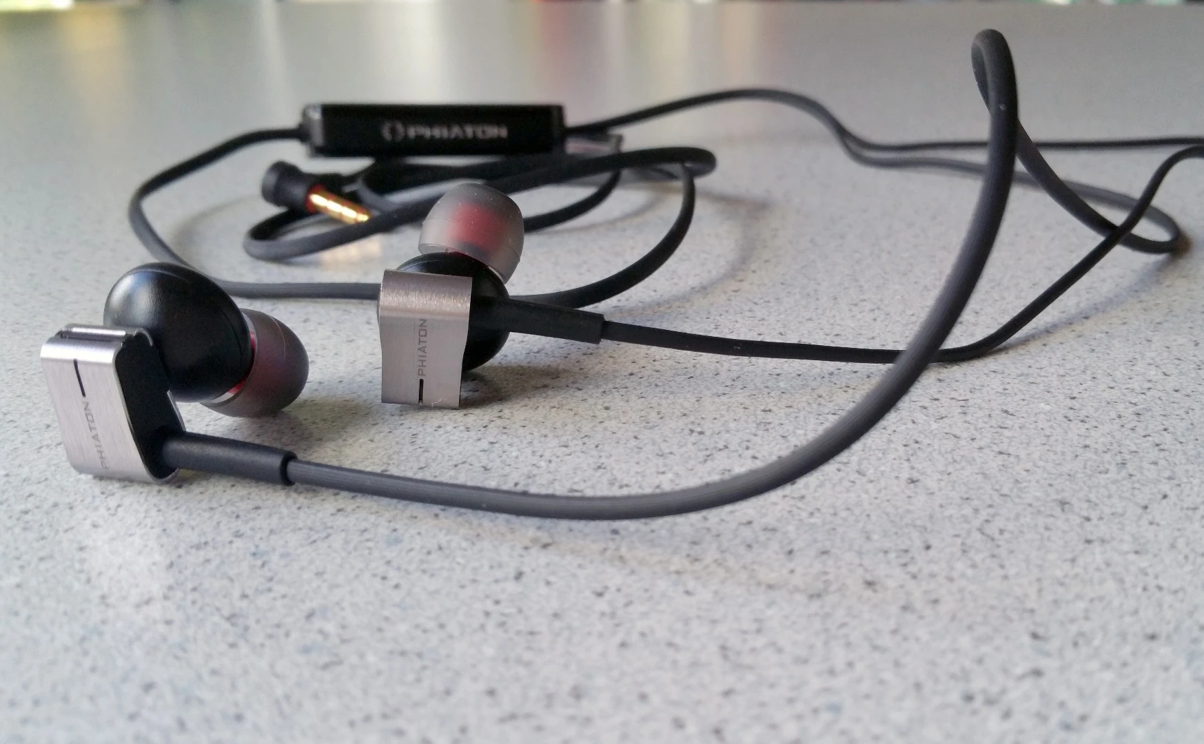 The Phiaton PS 202 NC combines what we love from cabled earphones with the power of active noise cancellation