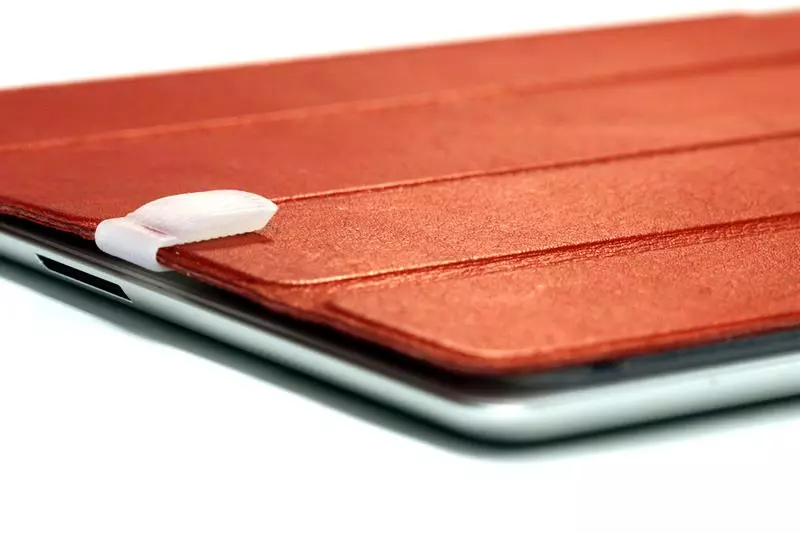 TouchFire can be attached to an iPad case when not in use via a pair of clips